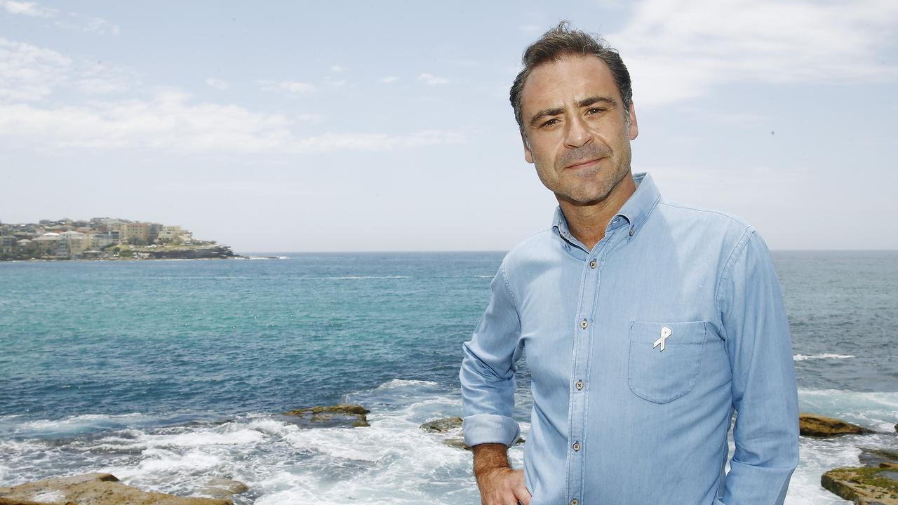 Andrew O’Keefe during his time as a White Ribbon ambassador at Bondi Beach. Picture: John Appleyard