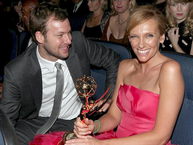 Toni Collette holds her Emmy as husband Dave Galafassi sits in the audience at the 61st Annual Primetime Emmy Awards in 2009. Photo by Mark Davis/CBS via Getty Images