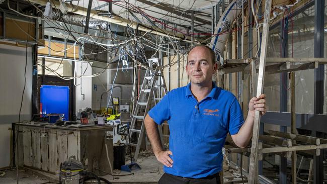 Surfers Paradise RSL club manager Jay Stopford standing in the new construction site at the Surfers Paradise RSL - all of its first floor is being gutted and redone in a $2m refurbishment - the bar, dining and TAB is moving temporarily up to the second level so it can continue trading. Picture: Jerad Williams