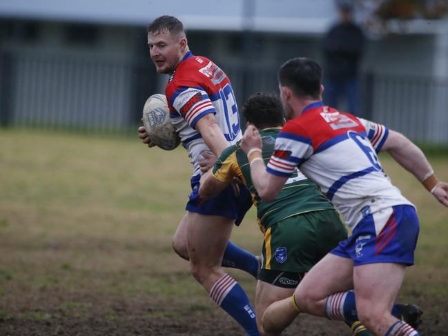 Sam Cookson makes a bust. Picture Warren Gannon Photography