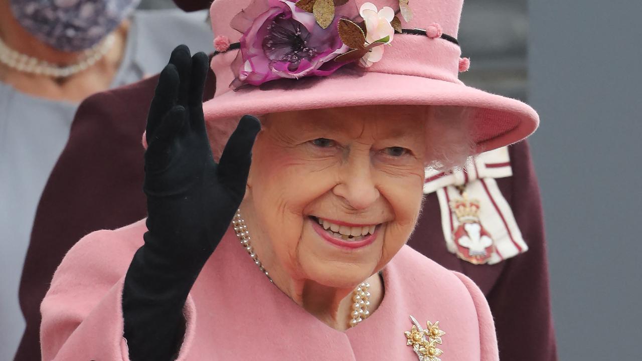 Queen Elizabeth II gestures on her departure after attending the ceremonial opening of the sixth Senedd. Picture: Geoff Caddick / AFP