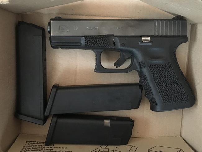 A “baby Glock” with associated parts.