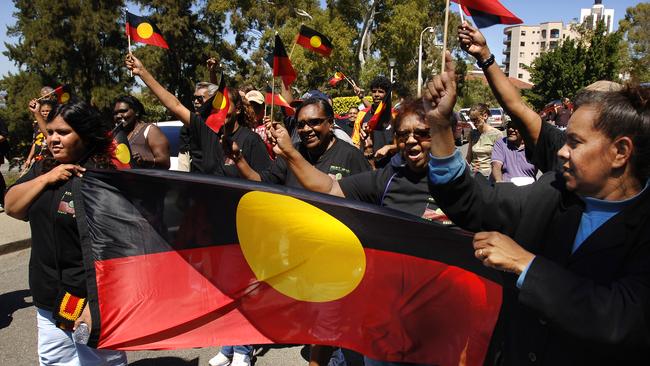 Noongar people celebrate their native title win outside Parliament House in Perth in 2006.