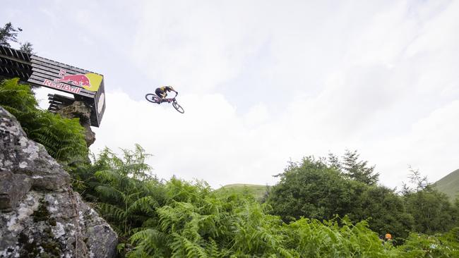 Ronan Dunne riding the road gap at RedBull Hardline in the Dyfi Valley, Wales on July 12th, 2023. Picture: Sam Dugon.