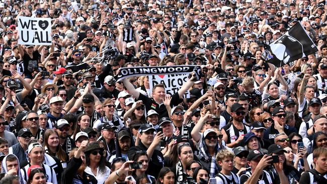 Collingwood fans turn out in their thousands at Melbourne’s Olympic Park to celebrate with the premiership-winning players on Sunday. Picture: Getty Images