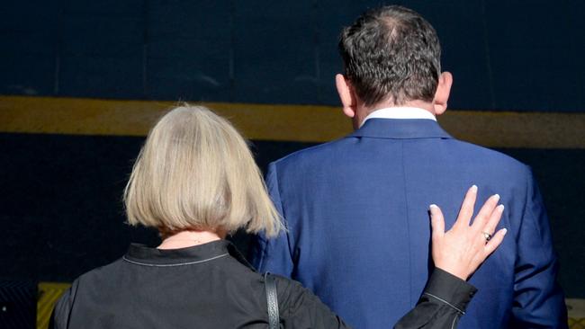 Daniel Andrews with his wife Catherine after announcing his resignation. Picture: NCA NewsWire/Andrew Henshaw