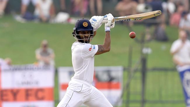 Sri Lanka's Roshen Silva plays a shot during the second day of the second Test match between Sri Lanka and England at the Pallekele International Cricket Stadium in Kandy on November 15, 2018. (Photo by ISHARA S. KODIKARA / AFP)