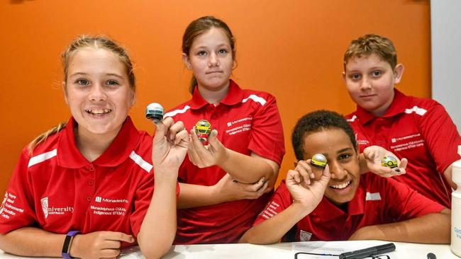 Zhanel College and Michael Stevens, 12 from Toolooa State High at the inaugural indigenous STEM camp. Picture: Matt Taylor GLA210319STEM