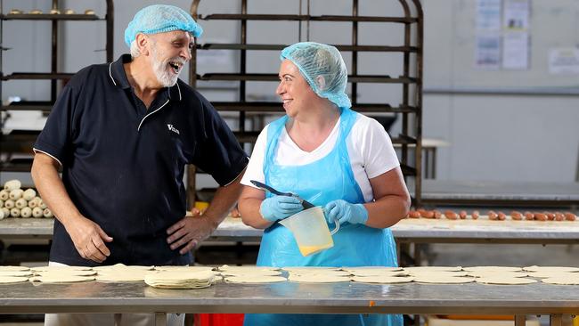 Vili at his factory in Mile End with staff member Fran Nichol. Picture: Calum Robertson