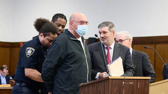 Allen Weisselberg is handcuffed after being sentenced at Manhattan Criminal Court on Wednesday. Picture: AFP