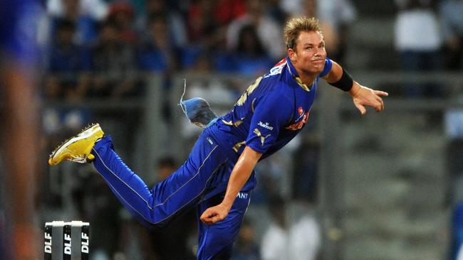 The late Shane Warne pictured playing in the IPL (Photo by Indranil MUKHERJEE / AFP)