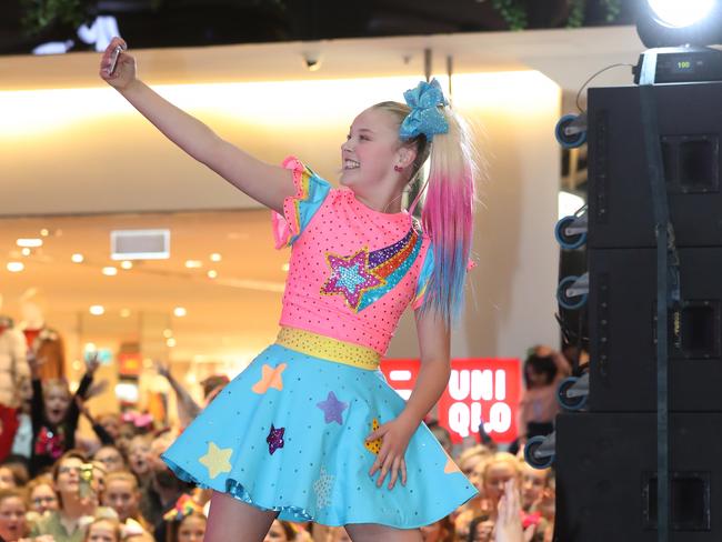 JoJo Siwa grabbing a selfie on stage at Westfields. Picture: AAP/David Swift