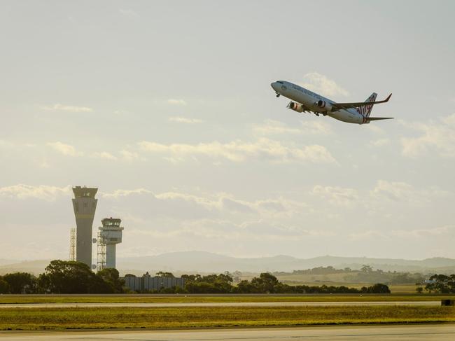 A flight takes off from Tullamarine Airport.