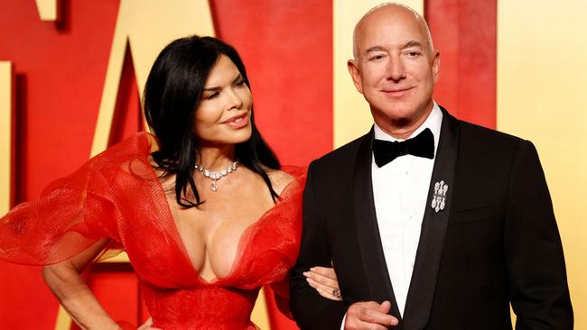 Jeff Bezos and girlfriend US actress Lauren Sanchez. Picture: Michael TRAN / AFP