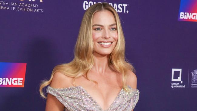 GOLD COAST AUSTRALIA - NewsWire Photos FEBRUARY 10, 2024:  Gold Coast Local Margot Robbie  arrives on the Red Carpet at the 2024 Aacta Awards at HOTA on the Gold Coast. Picture: NCA NewsWire / Glenn Campbell