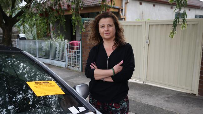 Katrina Gulabovski is upset at the local council and police passing the buck about which organisation should move a car that has blocked her driveway for six nights. Picture: Craig Wilson