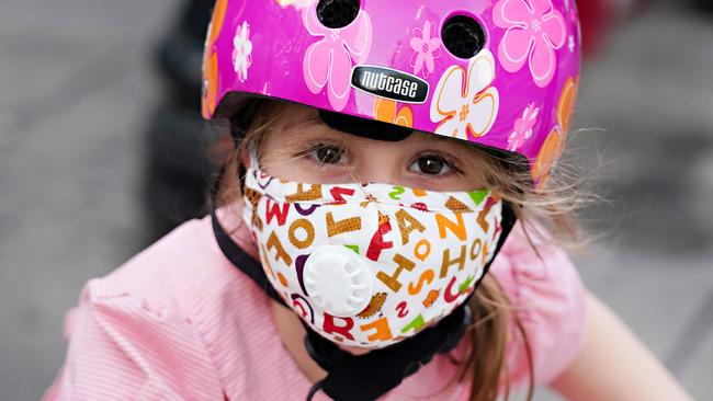 A child wearing a protective mask in New York City at the height of the pandemic. Picture: Cindy Ord/Getty Images