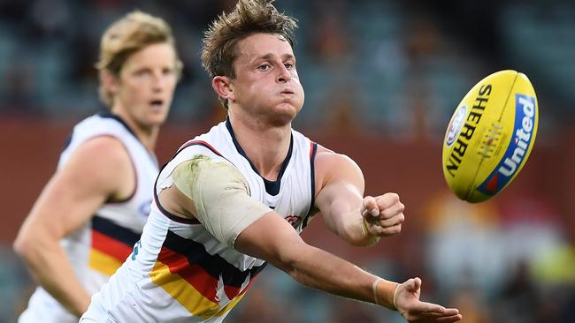 Matt Crouch never saw a handball he didn’t love, but he had a mountain of it against the Hawks. Picture: Getty Images