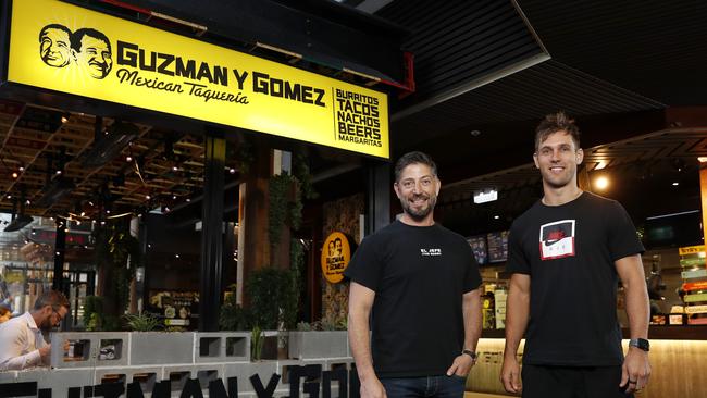 Guzman y Gomez founder Steven Marks (left) with AFL player Matthew de Boer. Picture: Jonathan Ng