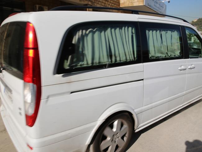 A minivan carries Australian journalist Tara Brown, Sally Faulkner, and the 60 Minutes crew to the airport. Picture: AP.