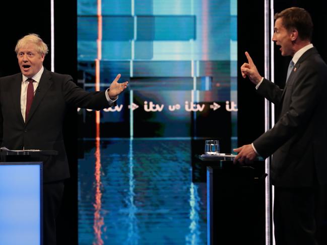 Conservative leadership contenders Boris Johnson and Foreign secretary Jeremy Hunt (R) take part in Britain's Next Prime Minister: The ITV Debate in Manchester on July 9, 2019. (Photo by Matt Frost / ITV / AFP) / RESTRICTED TO EDITORIAL USE - MANDATORY CREDIT "AFP PHOTO / ITV / MATT FROST " - NO MARKETING NO ADVERTISING CAMPAIGNS - DISTRIBUTED AS A SERVICE TO CLIENTS --- NO ARCHIVE ---