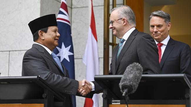 Indonesia’s then president-elect Prabowo Subianto shakes hands with Prime Minister Anthony Albanese during a press conference with Defence Minister Richard Marles in Canberra in August. Picture: Martin Ollman/NewsWire