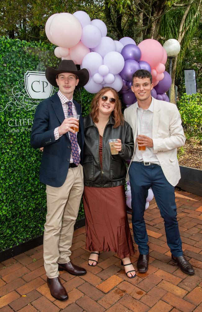 (From left) Jake Shaw, Brianna Dallinger and Ben Arnett. Weetwood Raceday at Toowoomba Turf Club. Saturday, September 28, 2024. Picture: Nev Madsen.