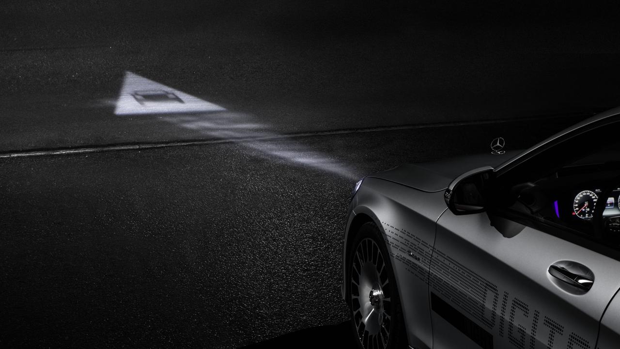 Digital light headlamps can project images onto the road.