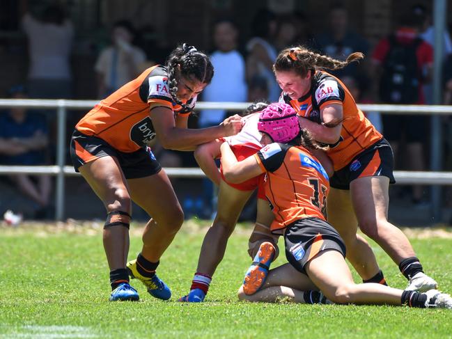 Ashanti Pennell (right) makes a tackle. Picture: Rhiannah Gebbie/Shot Of Guac Photography