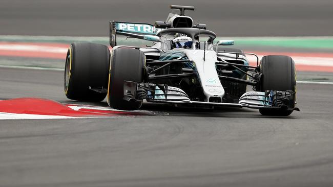 Mercedes driver Valtteri Bottas of Finland takes a curve.