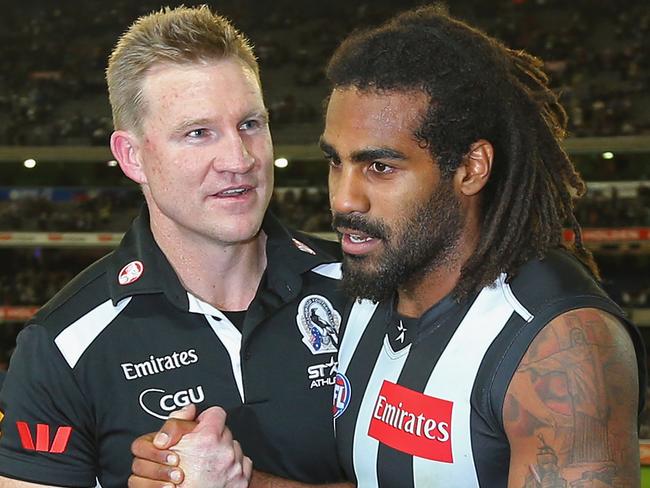 MELBOURNE, AUSTRALIA - MAY 18:  Nathan Buckley the coach of the Magpies and Harry O'Brien celebrate winning the round eight AFL match between the Collingwood Magpies and the Geelong Cats at Melbourne Cricket Ground on May 18, 2013 in Melbourne, Australia.  (Photo by Quinn Rooney/Getty Images)