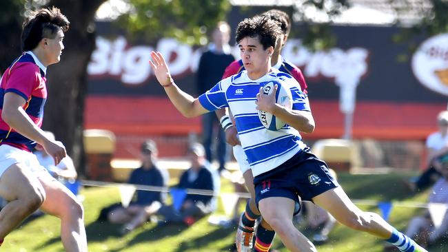 Nudgee College player Kai Combarngo (right) and Toshi Butlin of BSHS (left). Nudgee College v BSHS in the GPS First XV rugby. Saturday August 20, 2022. Picture, John Gass