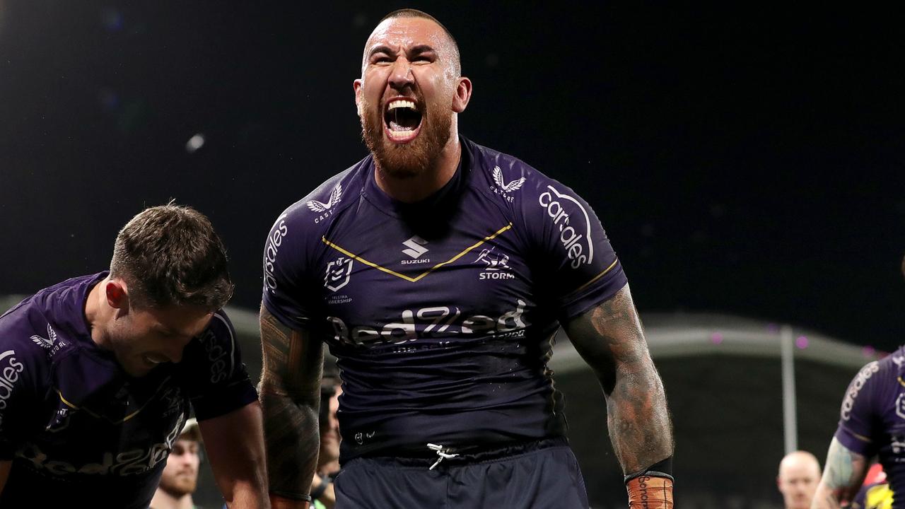 MELBOURNE, AUSTRALIA - SEPTEMBER 15: Nelson Asofa-Solomona of the Storm celebrates the try of Will Warbrick of the Storm during the NRL Semi Final match between Melbourne Storm and the Sydney Roosters at AAMI Park on September 15, 2023 in Melbourne, Australia. (Photo by Kelly Defina/Getty Images)