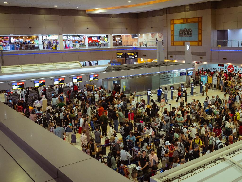 Queues of passengers formed at Bangkok’s Don Mueang Airport in Thailand. Picture: Mailee Osten-Tan/Getty Images