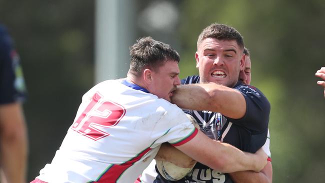 Jayden Butterfield taking a hit-up for Newcastle. Picture: Sue Graham