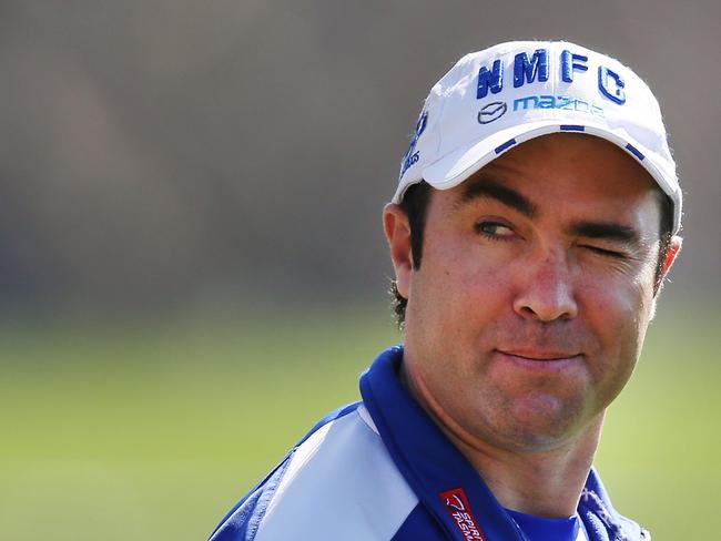 Kangaroos coach Brad Scott has seen AFL players cop a financial shirt-front after their career “too many times”. Picture: Michael Dodge/Getty Images