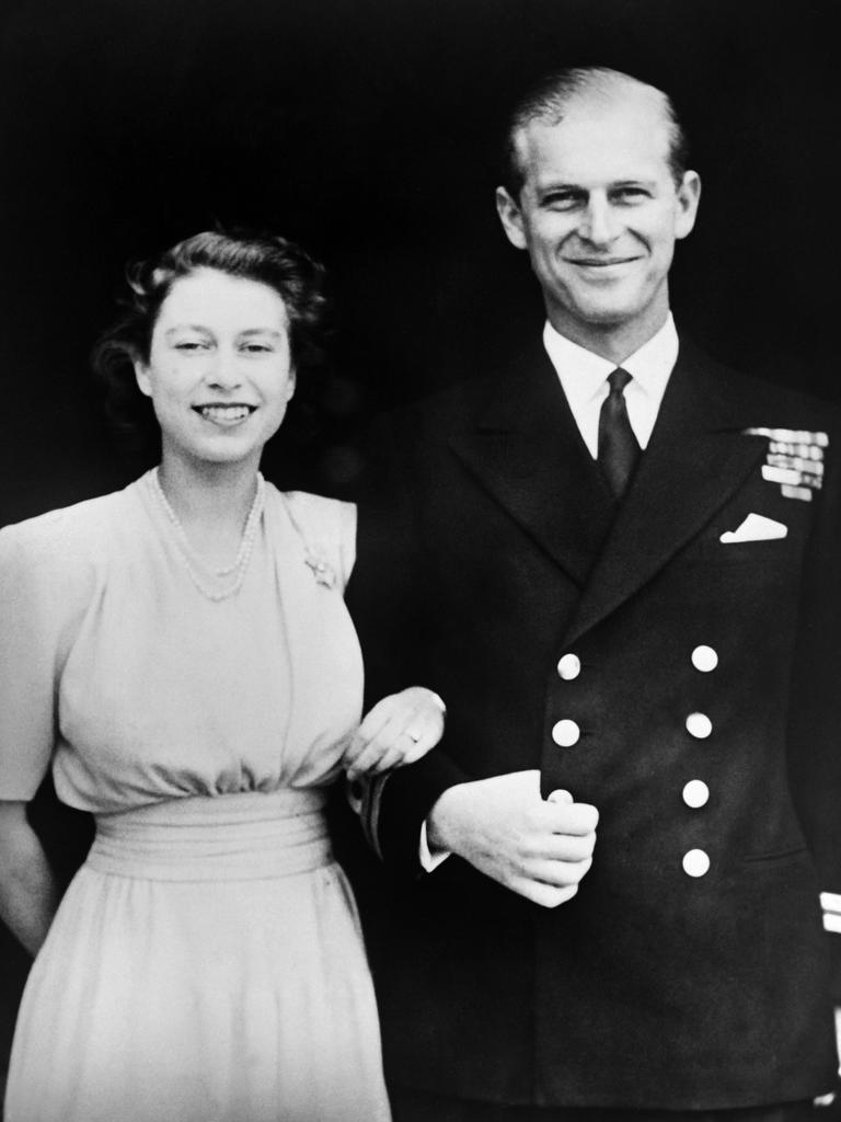 The then Princess Elizabeth and Philip of Greece on the day of their engagement outside Buckingham Palace.