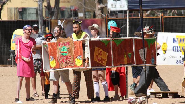 Team Shrek walks up to their race at the Henley on Todd in Alice Springs, Saturday, August 17, 2024. Picture: Gera Kazakov