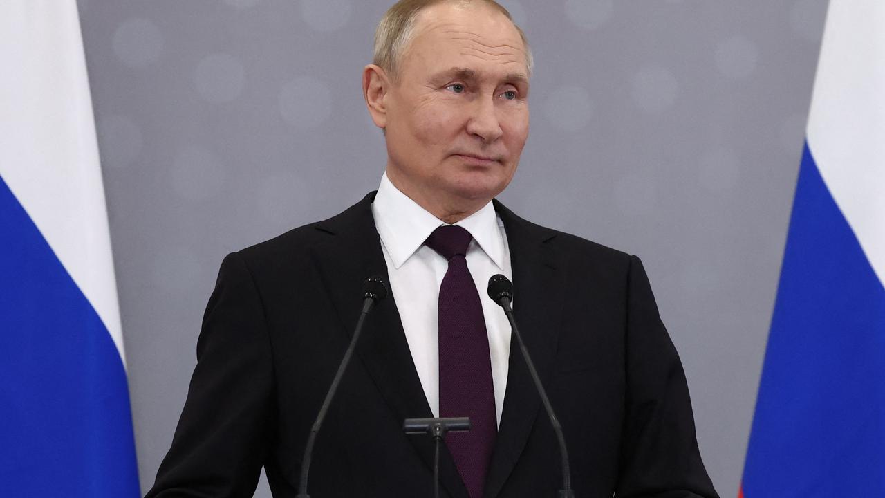 Russian President Vladimir Putin looks on during a press conference after attending a summit with leaders countries of the Russian led Commonwealth of Independent States in Astana on October 14, 2022. (Photo by Valery SHARIFULIN / SPUTNIK / AFP)