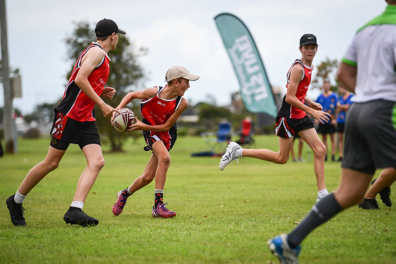 Callum Pearce is about to pass the ball for Hervey Bay.