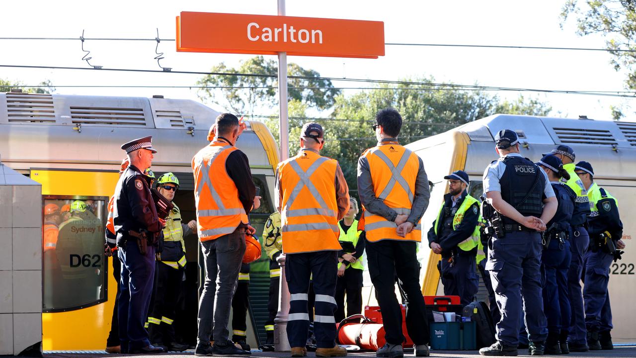 Emergency services at Carlton train station where a man and his daughter have died. Picture: Damian Shaw