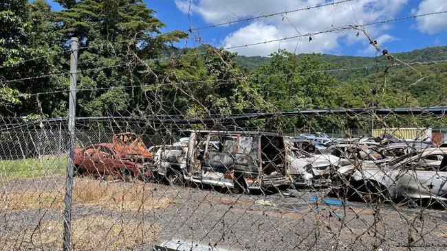 A fire at the Smithfield RoadTek depot destroyed at least 12 vehicles on March 22, closing the nearby Kennedy Hwy for more than an hour. Picture: Andreas Nicola