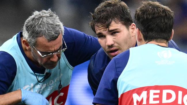 France captain Antoine Dupont receives medical attention during his side’s clash with Namibia at the Stade de Velodrome in Marseille. Picture: AFP