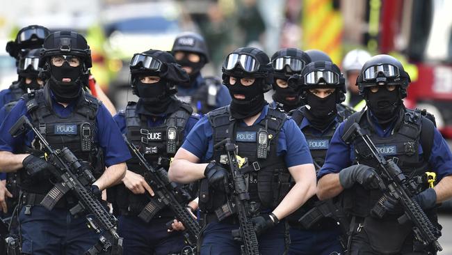 Armed police on St Thomas Street, London, Sunday June 4, 2017, near the scene of Saturday night's terrorist incident on London Bridge and at Borough Market. (Pic: Dominic Lipinski/AP)