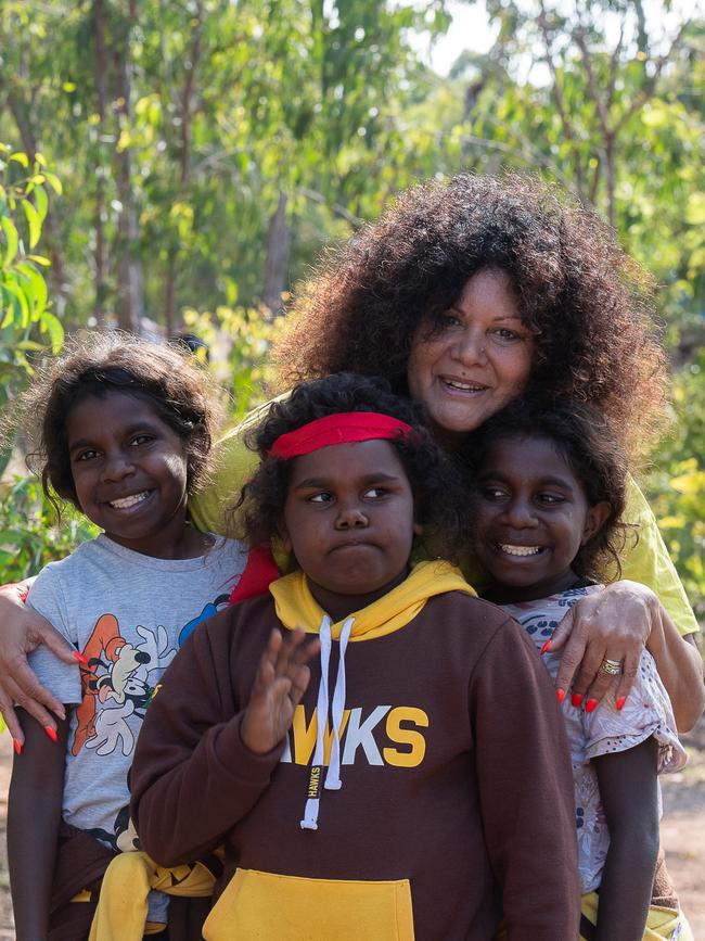 NT Senator Malarndirri McCarthy with her daughters Hadessah, 8, and her nine-year-old twins Ebony and Indiana after announcing a $4.7m investment into AFL NT. Picture: Pema Tamang Pakhrin