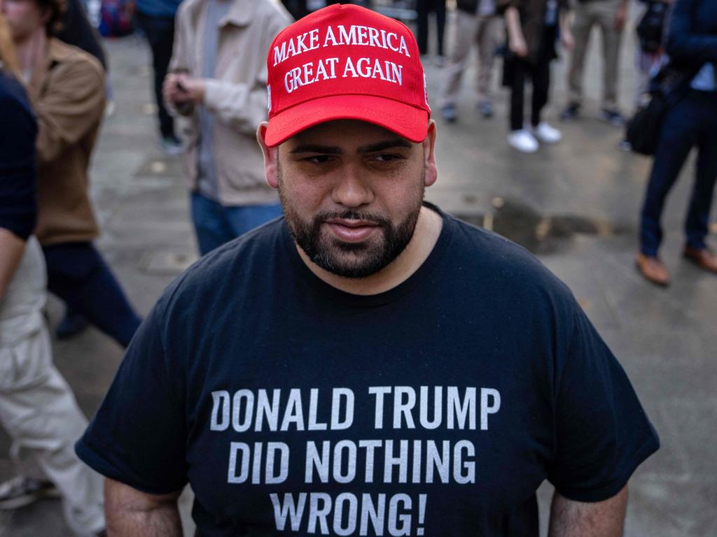 A supporter of Mr Trump outside court. Picture: Adam Gray / AFP