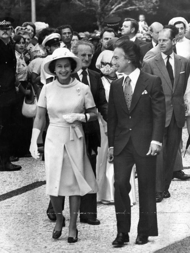The Queen walks with SA Premier Don Dunstan, accompanied by Prince Philip and Lord Mayor of Adelaide John Roche at Adelaide Festival Centre Plaza.