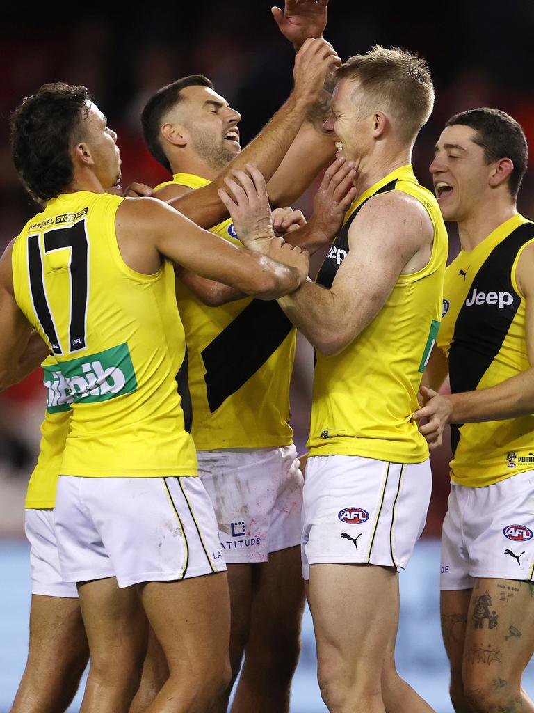 Tigers Daniel Rioli, Jack Graham, Jack Riewoldt and Jason Castagna celebrate a final term goal. Picture: Michael Klein