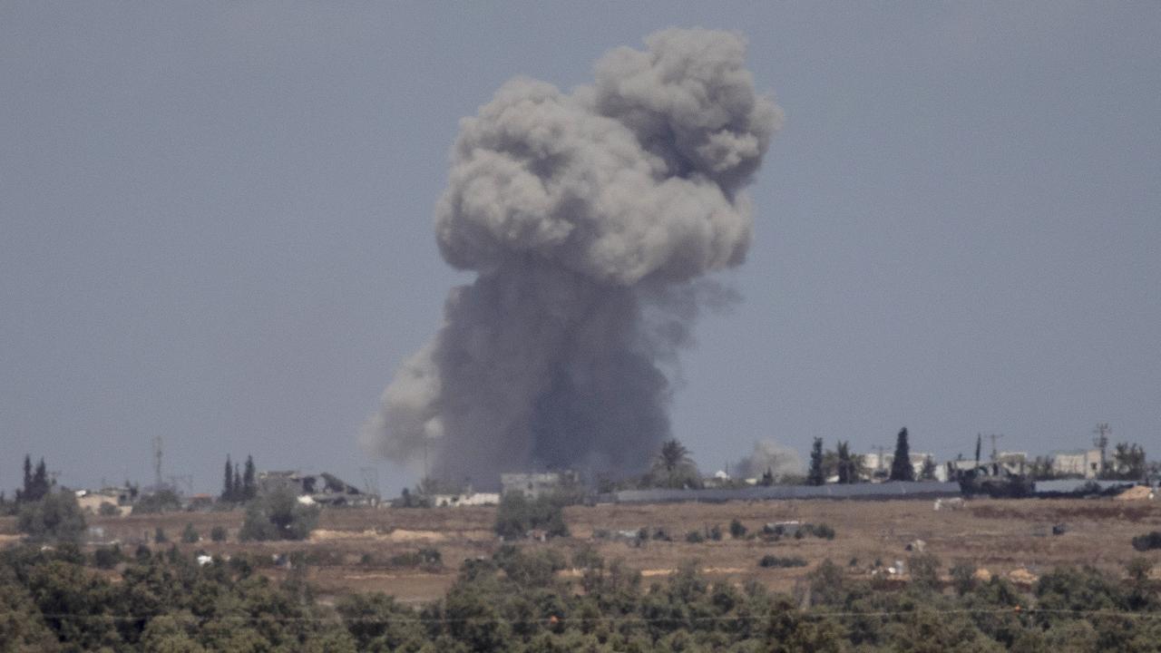 Smoke rise over the southern part of the Gaza Strip after an Israeli bombardment, as seen from the Israeli side from the border on May 7, 2024 in Southern Israel, Israel. Picture: Amir Levy/Getty Images