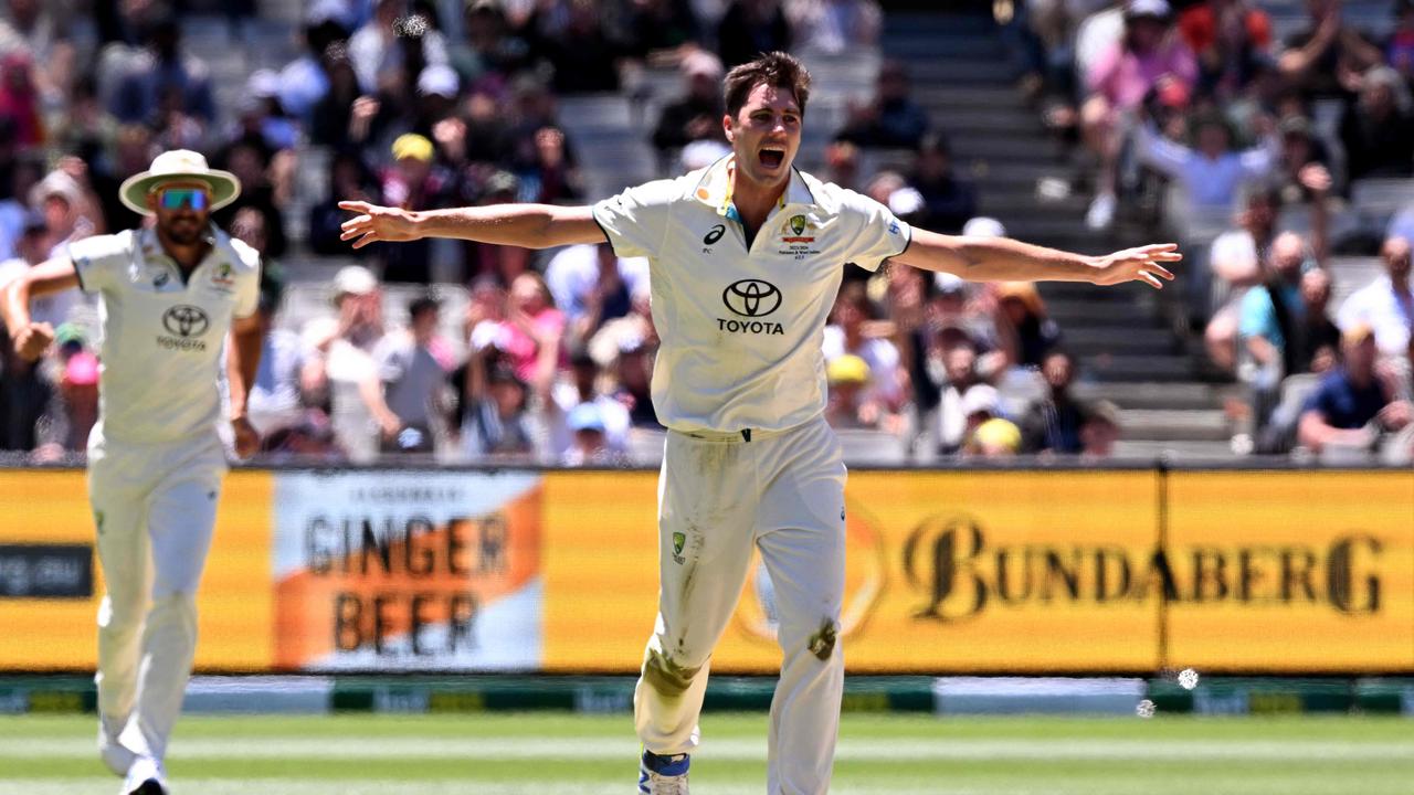 Australian bowler Pat Cummins celebrates dismissing Pakistan’s Imam-ul-Haq. Photo by William WEST / AFP
